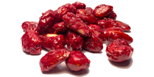 Mandle karamelizované s malinami 
  (cena za kilo)